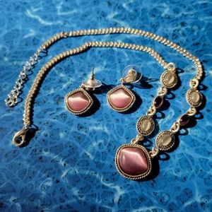 Beautiful silver necklace set with purple & grey cats eye stones & earrings.